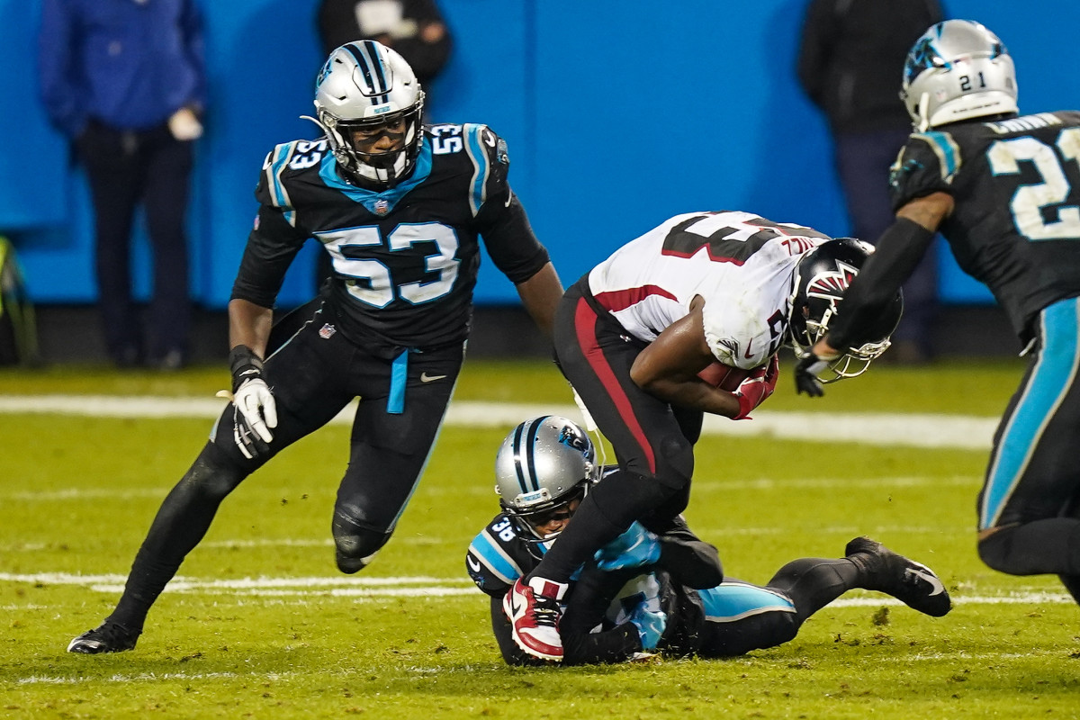 Oct 29, 2020; Charlotte, North Carolina, USA; Carolina Panthers defensive end Brian Burns (53) closes in on Atlanta Falcons running back Brian Hill (23) during the second half at Bank of America Stadium. 